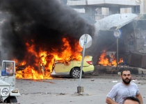 Blasts kill at least 100 in western Syria: Monitor