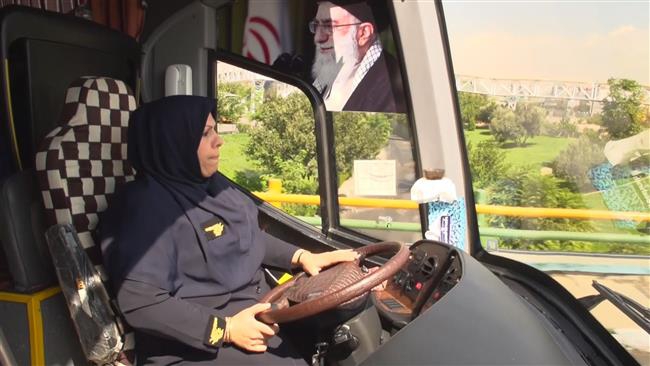 Plucky Iranian woman behind the wheels