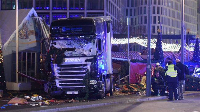 12 killed as truck barrels into Berlin Christmas market