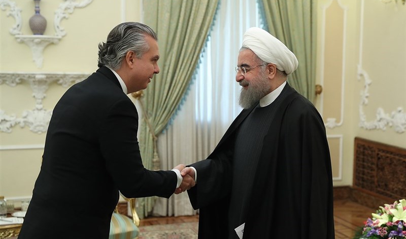 Irans President urges closer banking ties with Brazil
