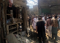 Bomb near mosque in northwest Pakistan kills at least 22, wounds dozens