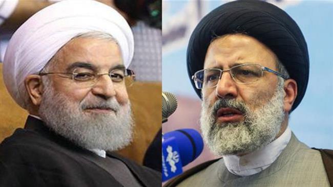 Rouhani, Raeisi in heated race to win over voters in Mashhad