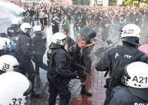 G20 protesters clash with police, set cars on fire