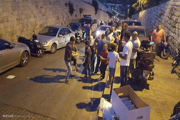 Iranian food packs handed out among Palestinians at Al-Aqsa Mosque