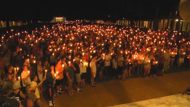 Hundreds attend Charlottesville vigil as outrage over Trumps remarks continues