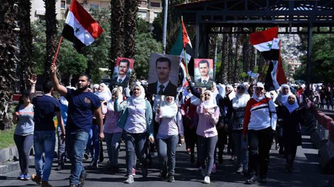 Syrians rally in Damascus in support of Assad against US-led strikes