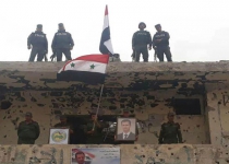 Internal Security Forces hoist national flag over al-Hajar al-Aswad and al-Yarmouk Camp