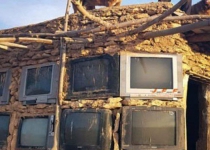 Iranian villager uses TV sets to build his strange house!