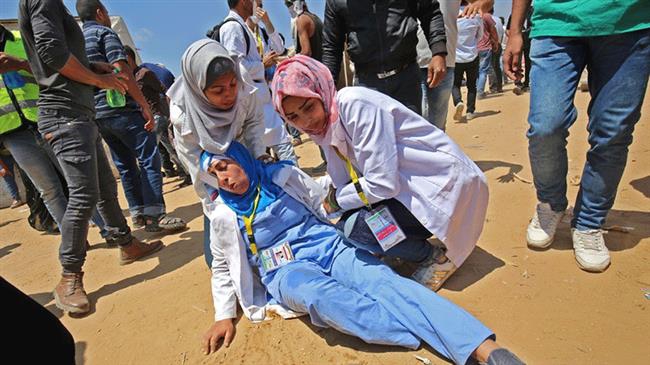 Thousands take part in funeral held for female paramedic killed by Israelis