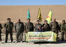 What is pushing Syrian Kurds to seek reunion with Damascus?