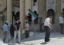 Basra youths symbolically clean Irans burned consulate