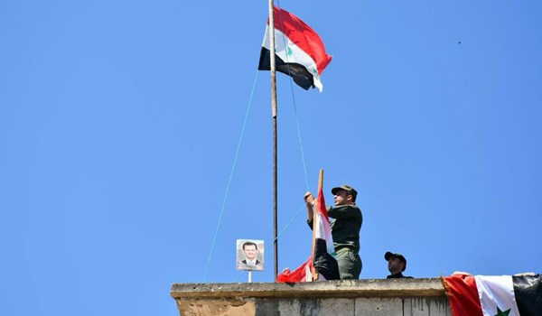 Syrian army raises flag over town near occupied Golan Heights