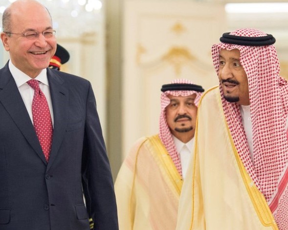 Iraqs president meets Saudi king after visiting rival Iran