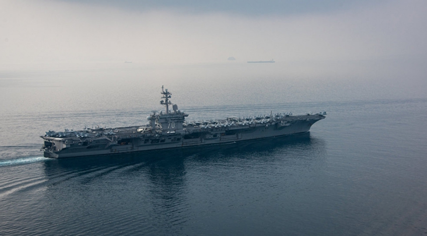 US aircraft carrier heads towards Persian Gulf after Iran unveils new warship