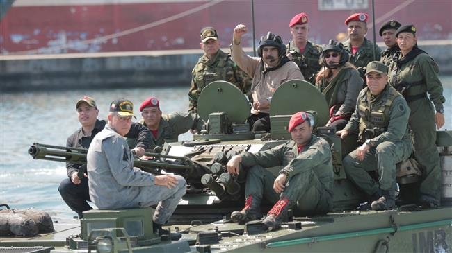 Maduro inspects army preparations in show of power to US-backed opposition