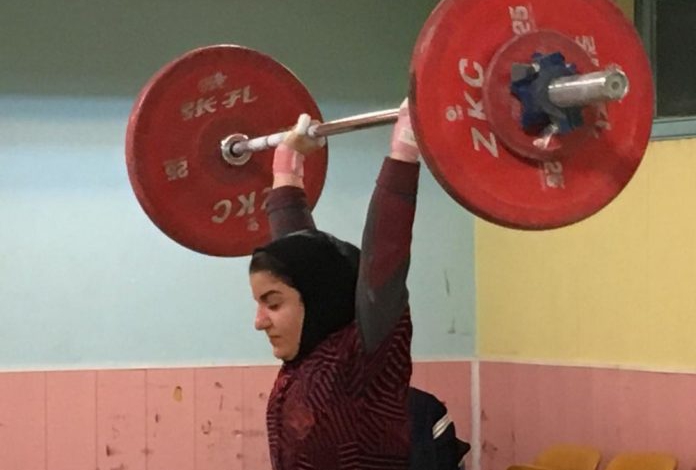Irans first female weightlifter talks of breaking taboos
