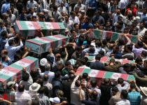 Photos: Mass funeral of war martyrs held in Tehran  <img src="https://cdn.theiranproject.com/images/picture_icon.png" width="16" height="16" border="0" align="top">