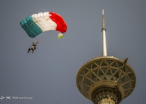 Photos: Paratroopers jump from Milad Tower  <img src="https://cdn.theiranproject.com/images/picture_icon.png" width="16" height="16" border="0" align="top">