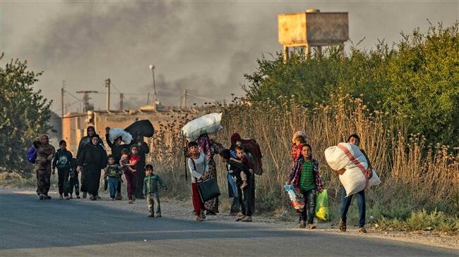 Civilians flee Syrian border towns as Turkish offensive kicks off
