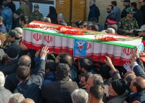 Iran buries martyrs as anti-rioting rallies expand
