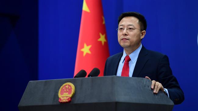 China says US should lifts sanctions as Iran struggles with virus outbreak
