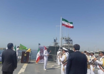Iranian flag hoisting over Jamaran Destroyer