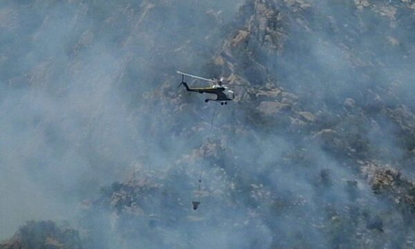 IRGC helping Turkey to put out fire by 1 plane, 2 helicopters