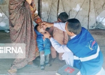 Non-Iranian children receive polio vaccine in Qom
