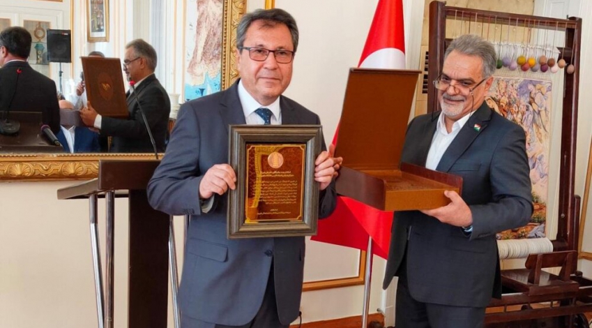 Turkish scholar Ali Temizel decorated with Irans Shahriar Medal