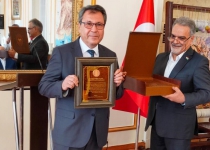 Turkish scholar Ali Temizel decorated with Irans Shahriar Medal