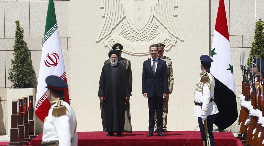 Irans president arrives in Syria on key visit