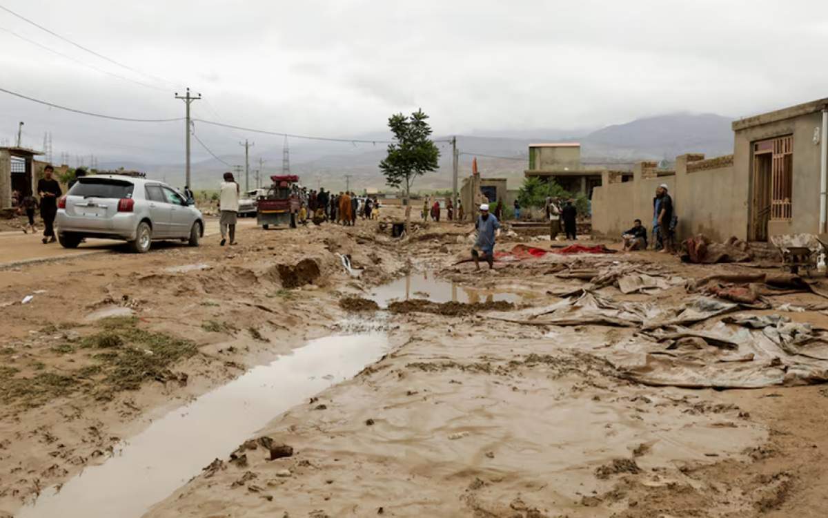 People clear damages caused in the aftermath of floods following heavy rain, in Sheikh Jalal District, Baghlan province, Afghanistan, on May 11, 2024. (Photo by Reuters)