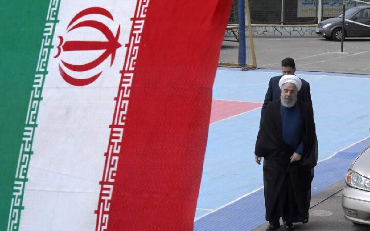 عکسی از حسن روحانی در حال شرکت در انتخابات