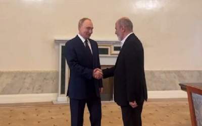 Top Iranian security official meets Putin