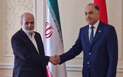 Secretary of Iran’s Supreme National Security Council Ali Akbar Ahmadian (L) shakes hands with the State Secretary of Belarusian Security Council Alexander Wolfovich in Minsk on September 13, 2024.