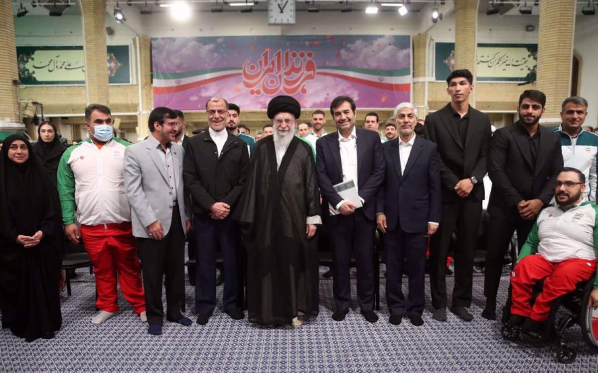 Leader of the Islamic Revolution Ayatollah Seyyed Ali Khamanei (C) poses for a photograph with a group of Iranian medalists, athletes, coaches and organizers of Iranian sports delegations to the 2024 Paris Olympics and Paralympics in Tehran, Iran, on September 17, 2024.