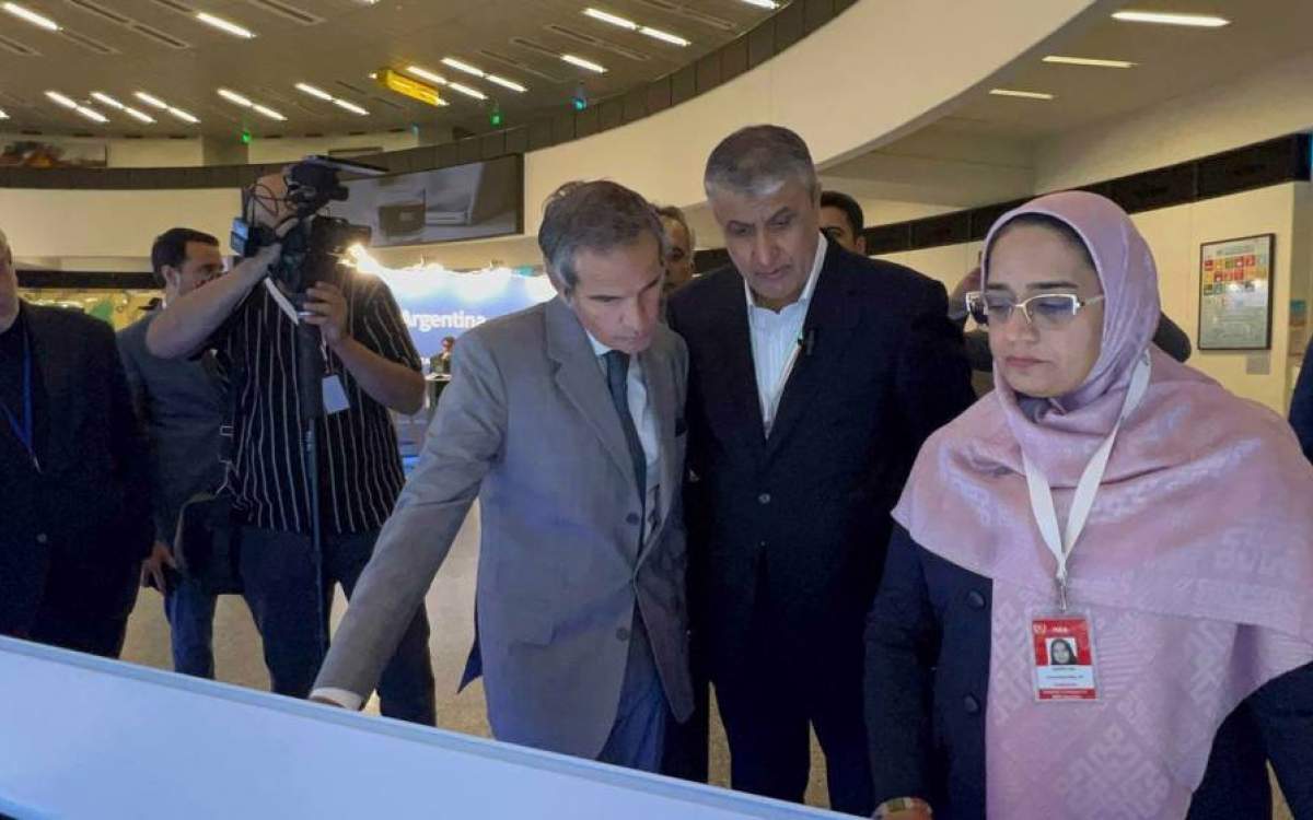 Director General of the International Atomic Energy Agency (IAEA) Rafael Grossi (C) visits Iran’s achievements in the nuclear industry, which have been put on display on the sidelines of the 68th General Conference of the International Atomic Energy Agency (IAEA) in Vienna, Austria, on September 18, 2024.