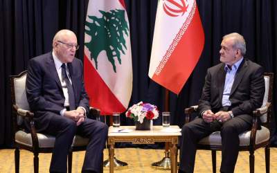 Iran’s President Masoud Pezeshkian (R) meets with Lebanon’s caretaker Prime Minister Najib Mikati in New York on September 25, 2024 on the sidelines of the 79th session of the United Nations General Assembly.