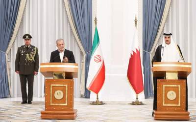 Iranian President Masoud Pezeshkian (L) addresses a joint press conference with Qatar’s Prime Minister Sheikh Tamim bin Hamad Al Thani in the Qatari capital Doha on Wednesday, October 02, 2024.