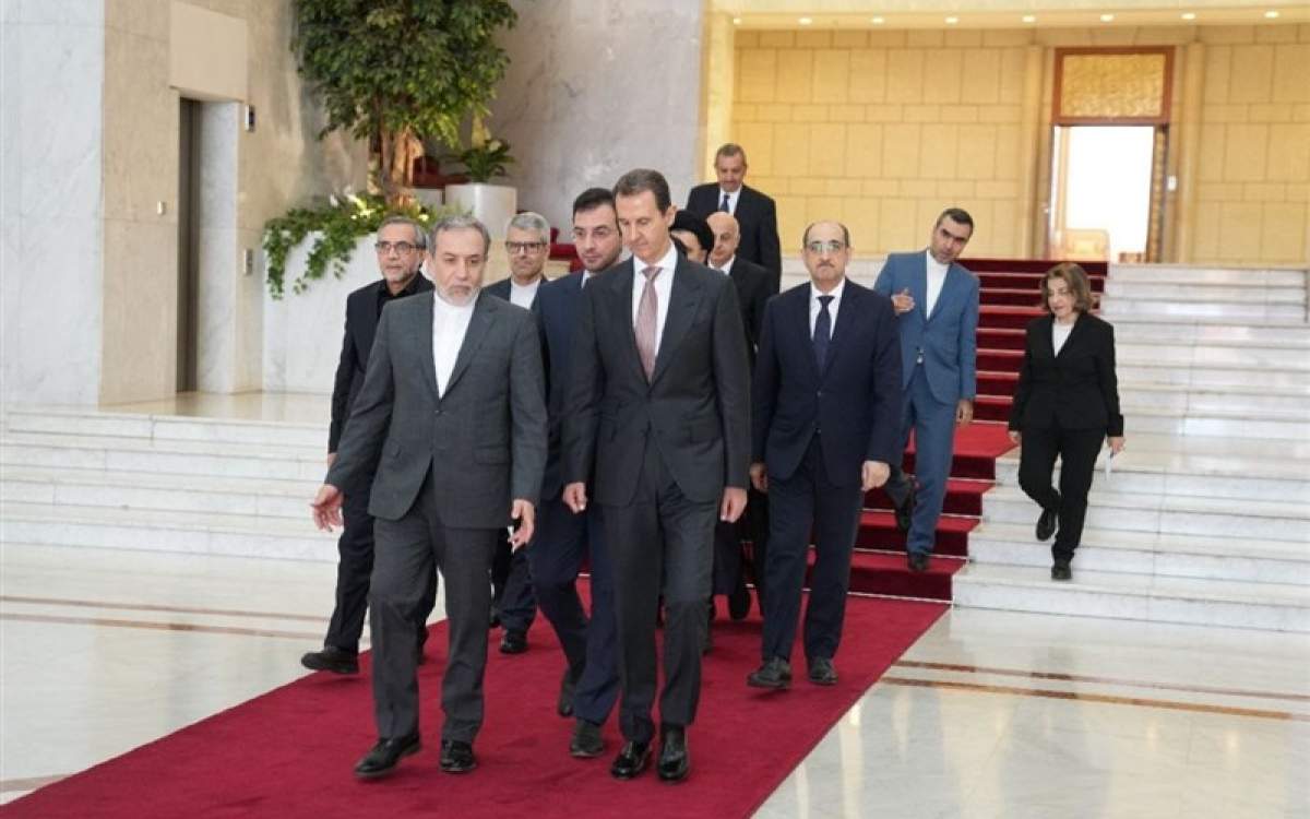 Syrian President Bashar al-Assad (R) receives Iranian Foreign Minister Abbas Araghchi at the presidential palace in Damascus on Oct. 4, 2024.