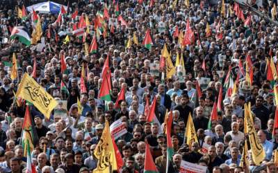 Iranians hold a massive funeral ceremony in Tehran for Major General Abbas Nilforoushan.