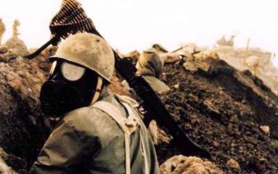 An Iranian soldier wearing a gas mask during Iraq