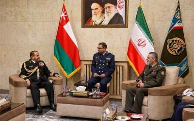 Iran’s Chief of Staff of the Armed Forces, Major General Mohammad Baqeri, (R) receives Vice Admiral Abdullah Khamis Al Raisi, Chief of Staff of the Sultanate of Oman