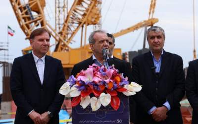 Iranian President Masoud Pezeshkian (C) delivers a speech during his visit of the Bushehr Nuclear Power Plant, which is located in southern Iran, on February 13, 2025.