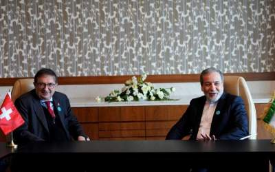 Iran’s Foreign Minister Abbas Araghchi (R) meets with Wolfgang Amadeus Bruelhart, the Swiss Special Envoy for the Middle East and North Africa, on the sidelines of the 8th Indian Ocean Conference in Oman on February 17, 2025.