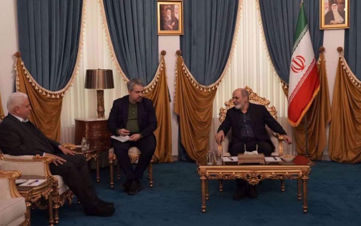 Secretary of Iran’s Supreme National Security Council (SNSC) Ali Akbar Ahmadian (R) meets with head of Iraq’s Popular Mobilization Units (PMU), also known as Hashd al-Sha’abi, Falih al-Fayyadh in Tehran on February 18, 2025.