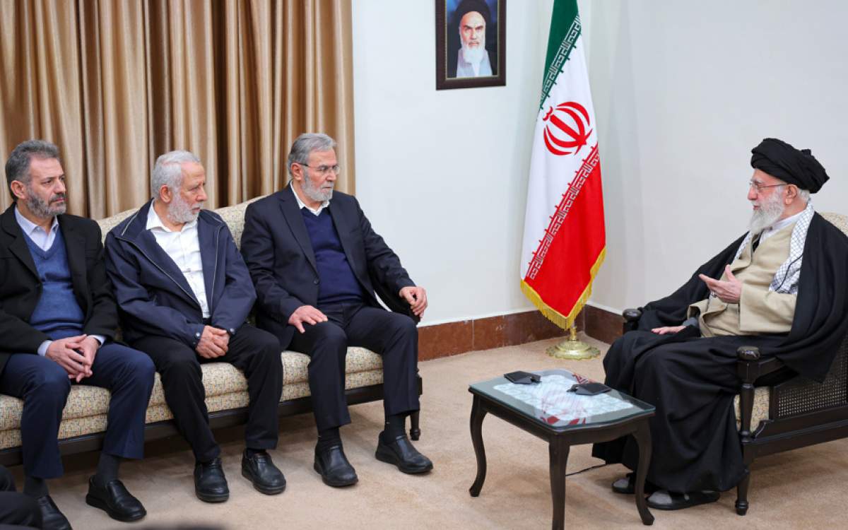 Leader of the Islamic Revolution Ayatollah Seyyed Ali Khamenei, right, meets Secretary-General of Palestinian Islamic Jihad Ziyad al-Nakhaleh in Tehran on February 18, 2025.