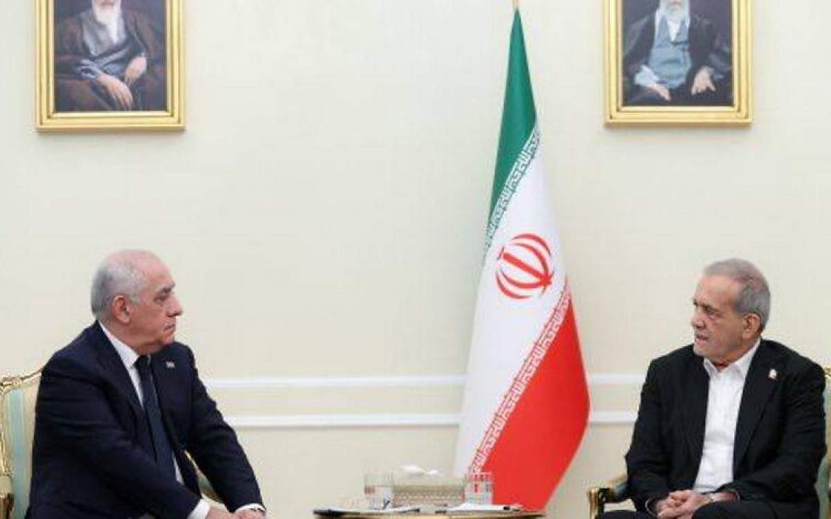 President Masoud Pezeshkian (right) meets with Azerbaijan’s Prime Minister Ali Asadov in Tehran on February 18, 2025.