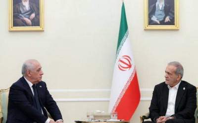 President Masoud Pezeshkian (right) meets with Azerbaijan’s Prime Minister Ali Asadov in Tehran on February 18, 2025.